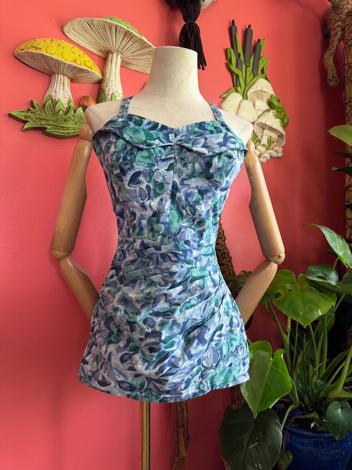 1950s blue and green floral print sarong style petal bust swimsuit